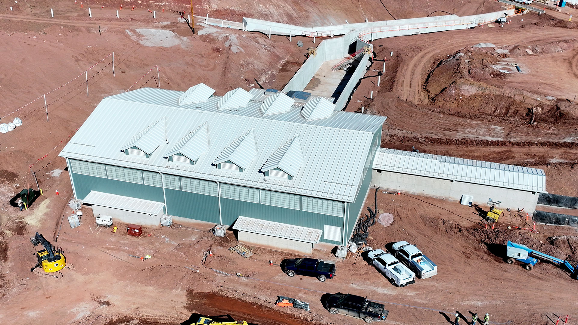 Aerial image of Chimney Hollow valve house with cars around. 