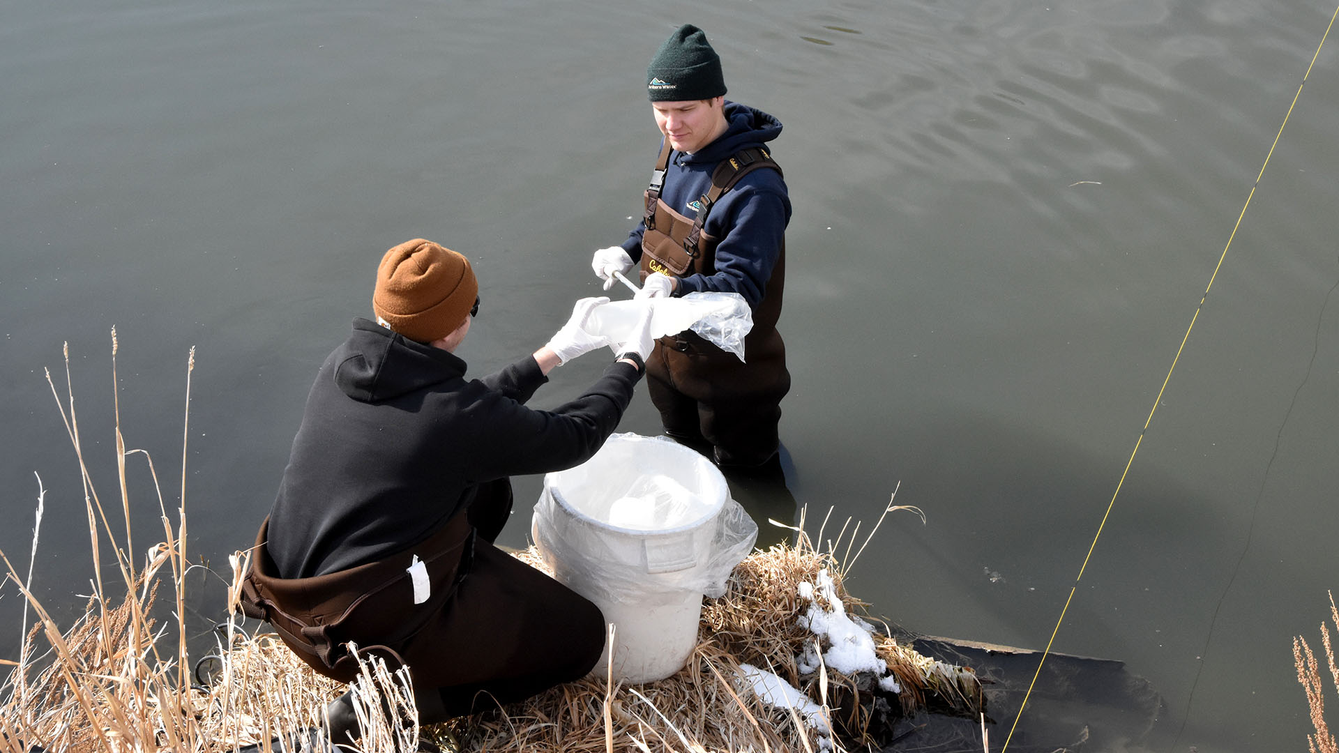 Northern Water employees testing water. 