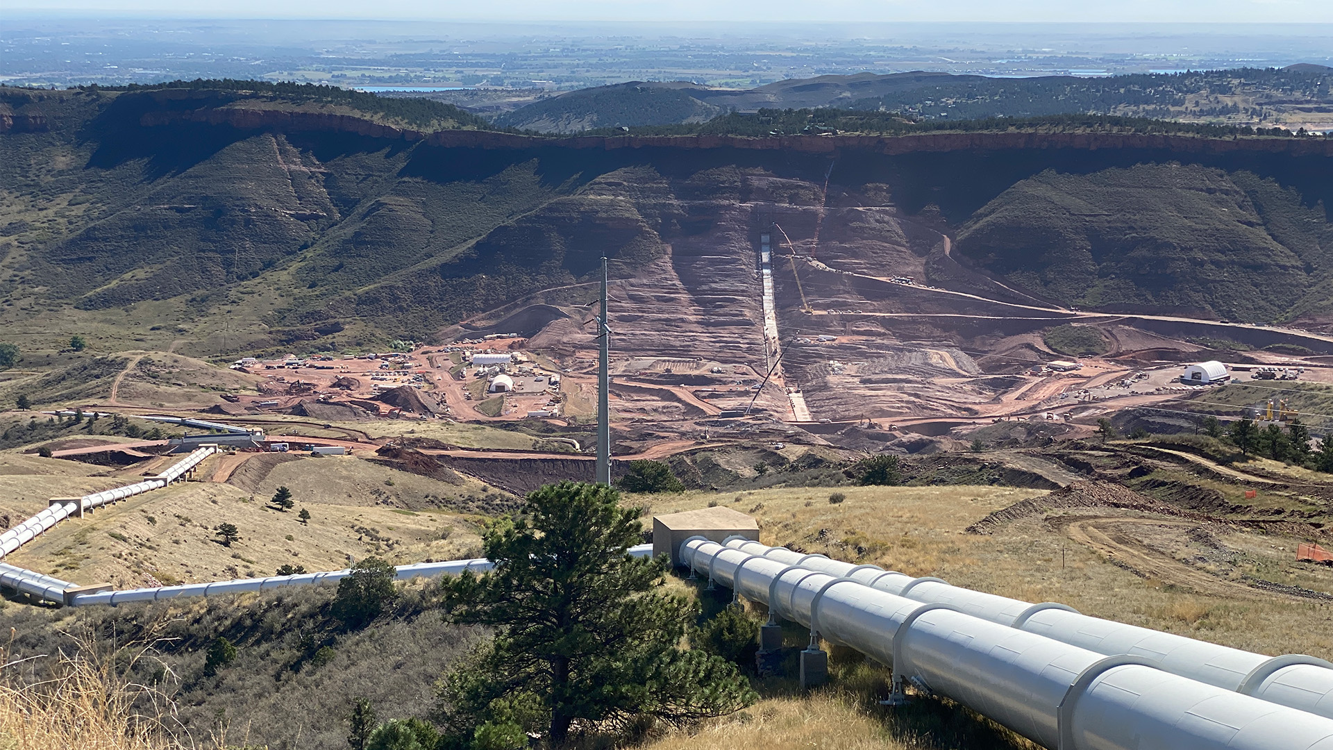 Looking east at the Chimney Hollow construction with the Flatiron Penstocks in the foreground.