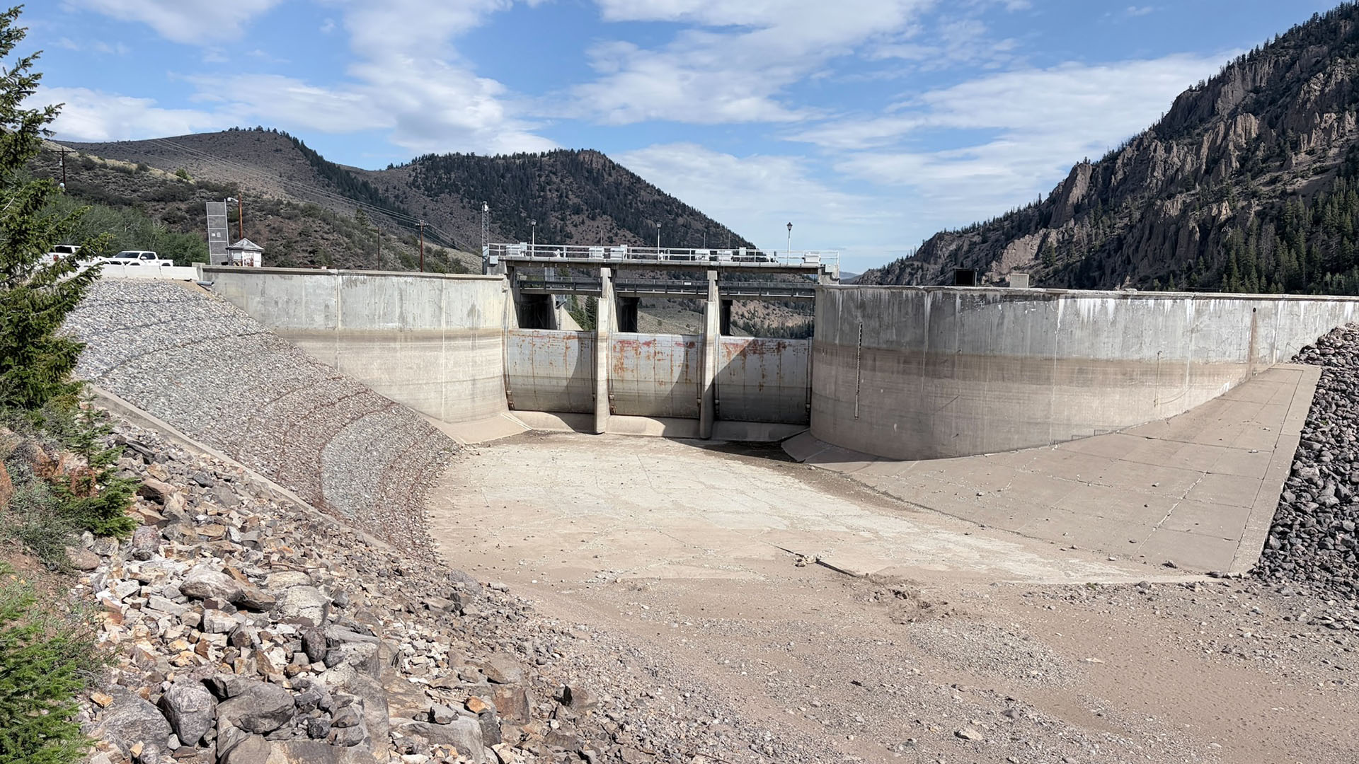 A water reservoir dam spillway is empty due to contruction work.