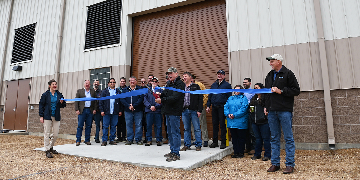 Staff cuts the ribbon at the Eastern Pump Plant ribbon cutting ceremony
