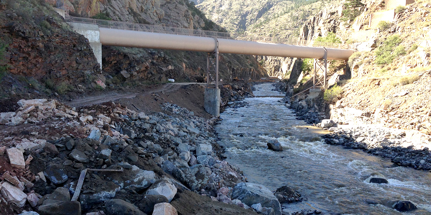 Big Thompson Canyon with waters rushing and debris below the C-BT Siphon during the 2013 flood