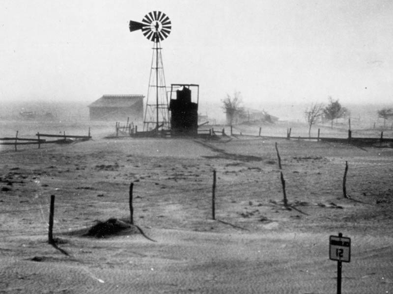 Windmill during dust storm. 