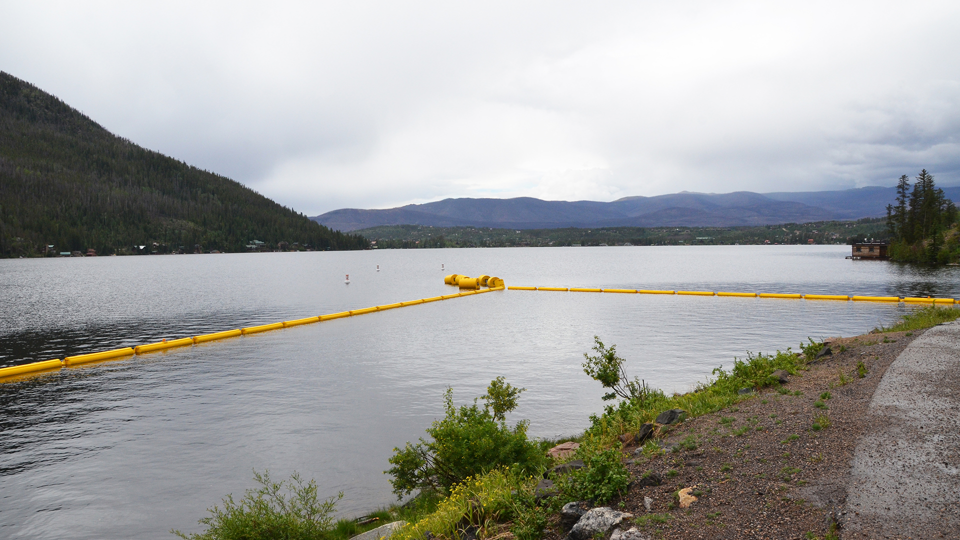 A complete debris boom on Grand Lake. 