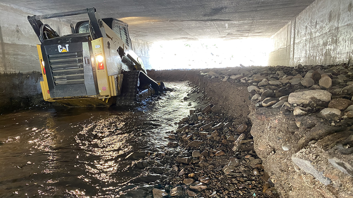 This photo shows how debris and sediment have been settling and compacting under the Highway 125 bridge over Willow Creek, similar to how it’s been collecting at other locations along the road.