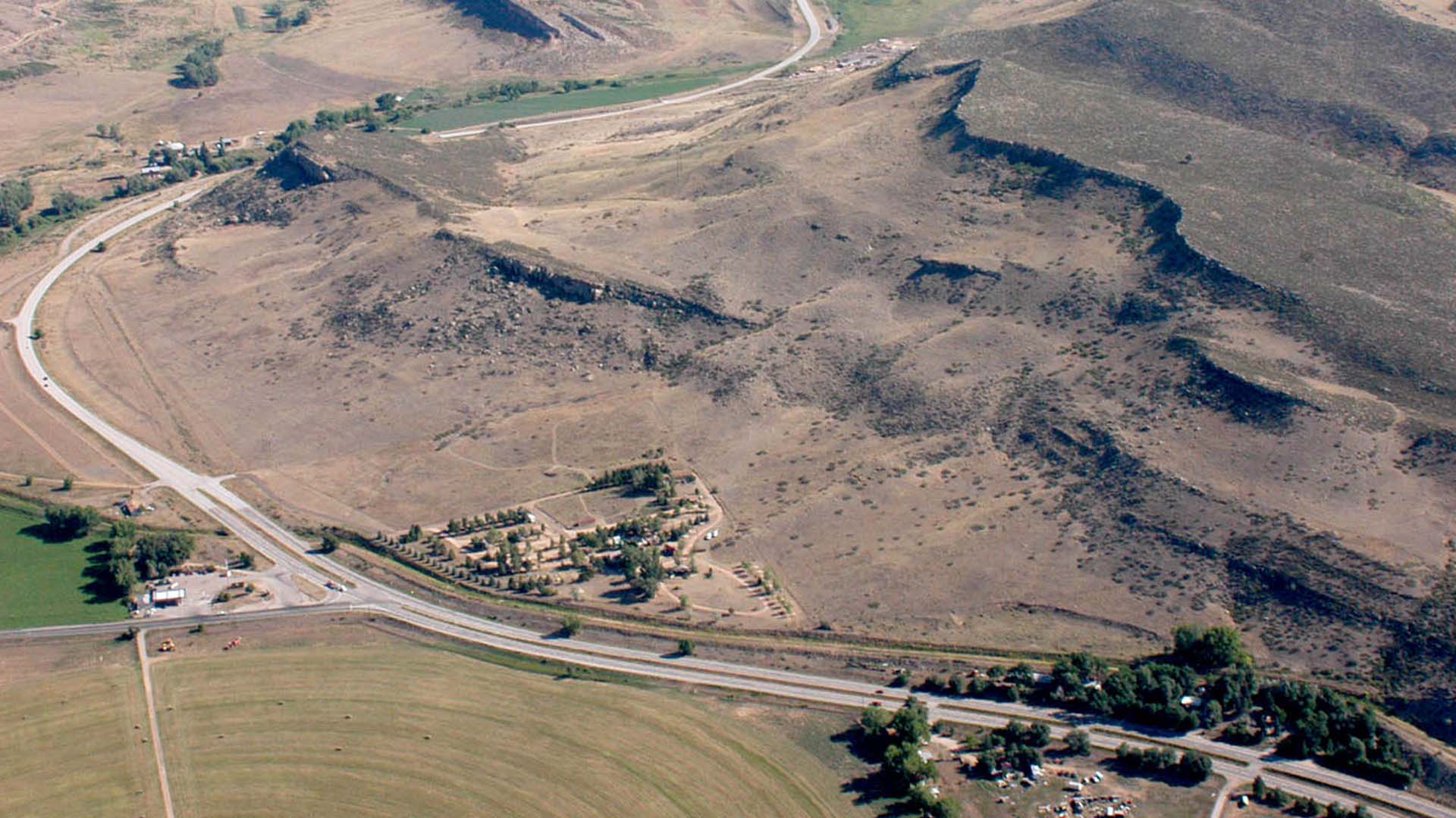 Aerial image of Highway 287 in the future Glade Reservoir valley.