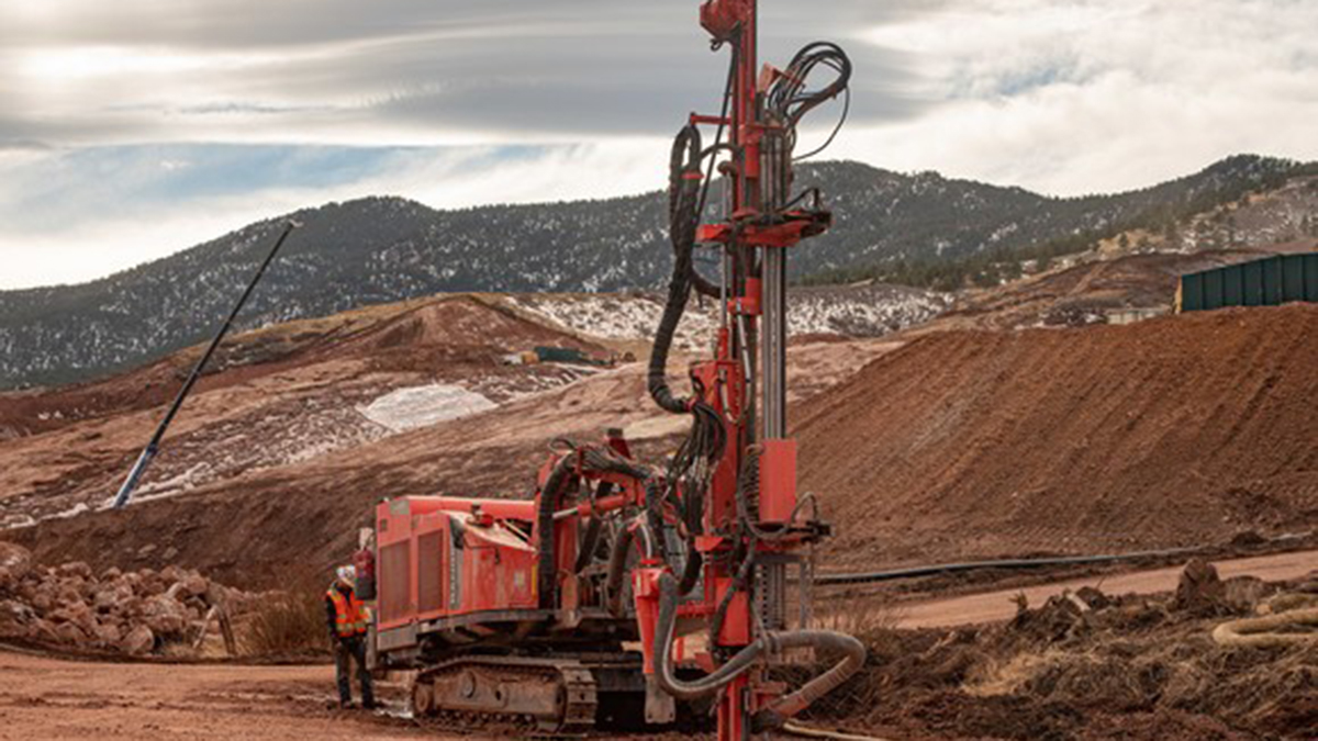 Drilling rig on site at Chimney Hollow.