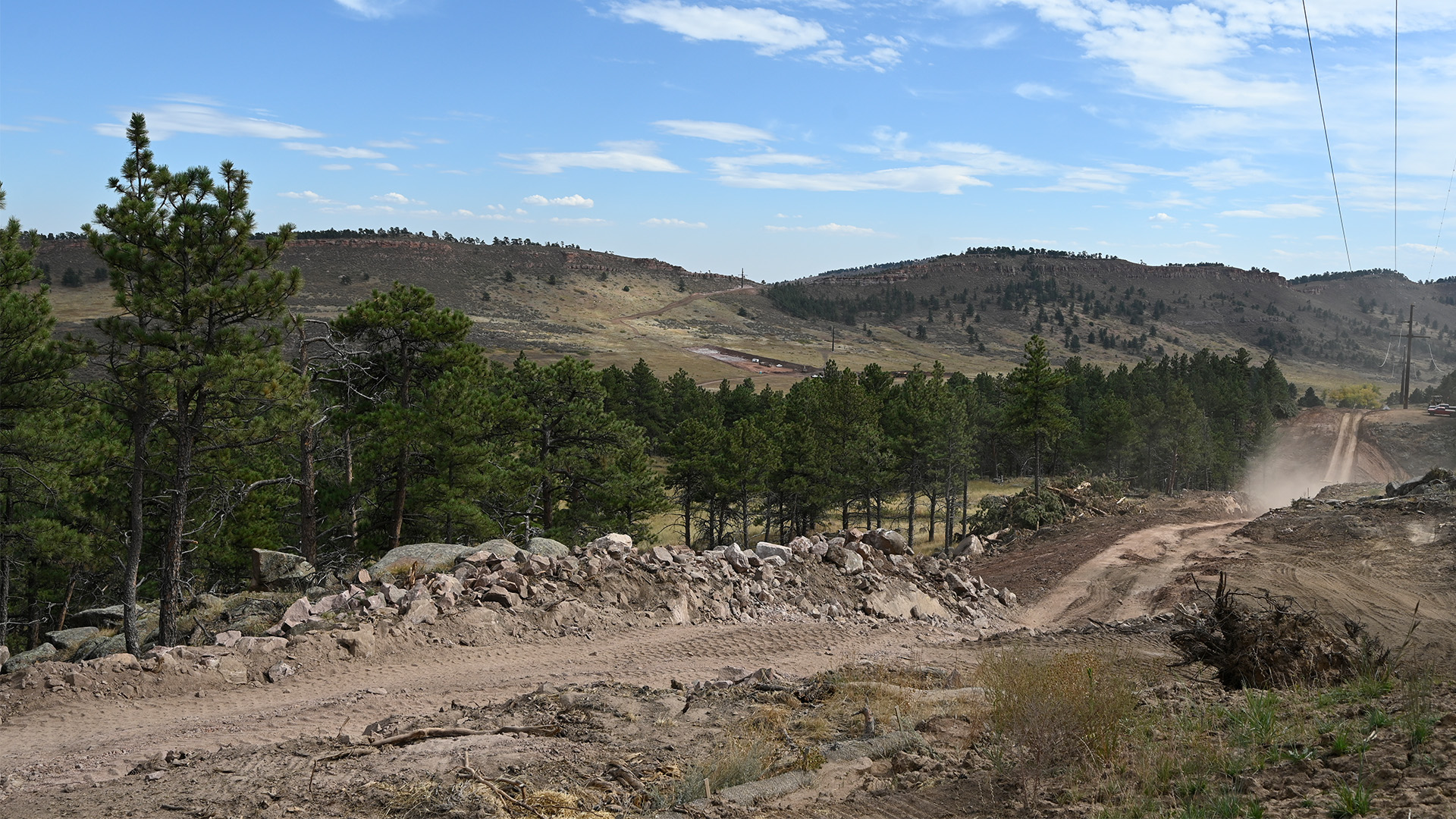 Construction of the saddle dam access road.