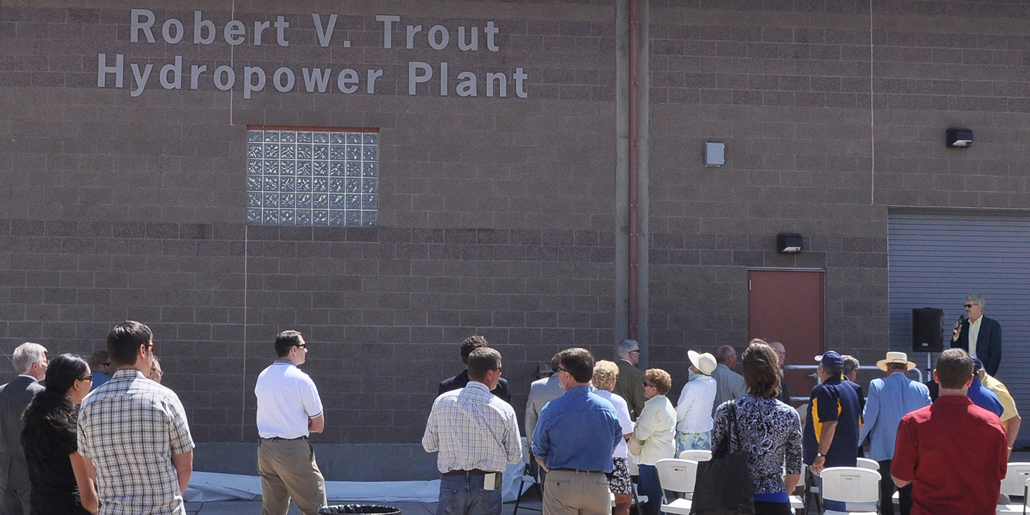 People gathered at Trout Hydropower Plant for ribbon cutting and dedication