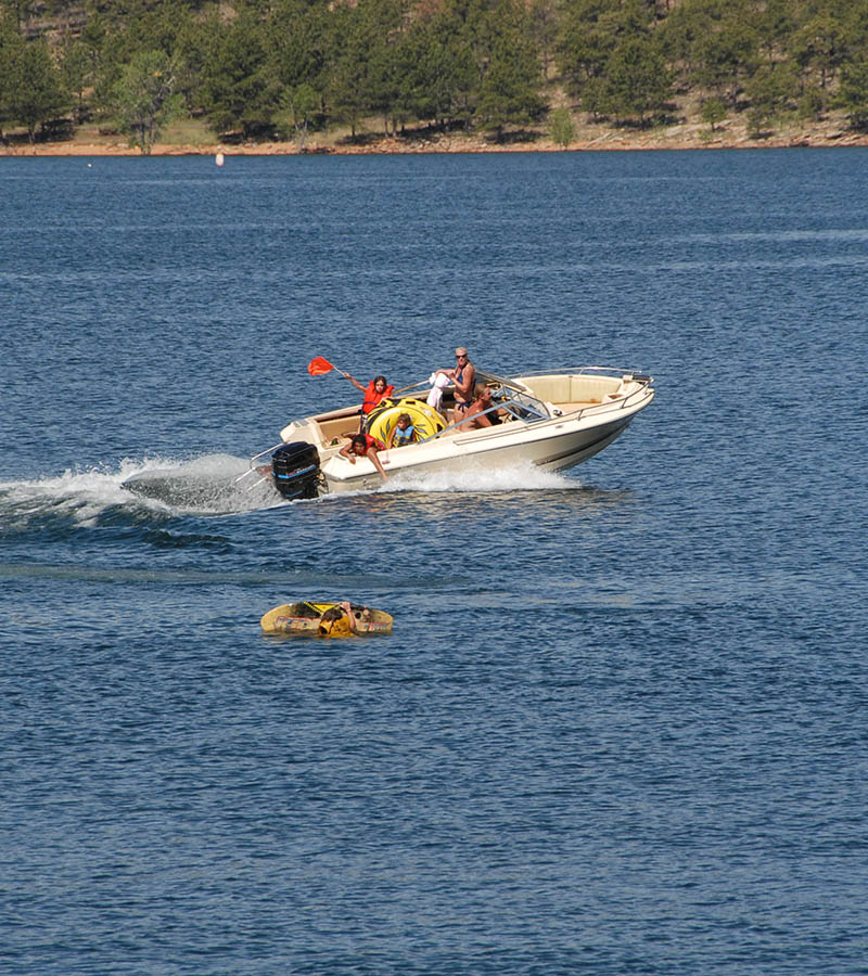 Family enjoying a boating day at Carter Lake.