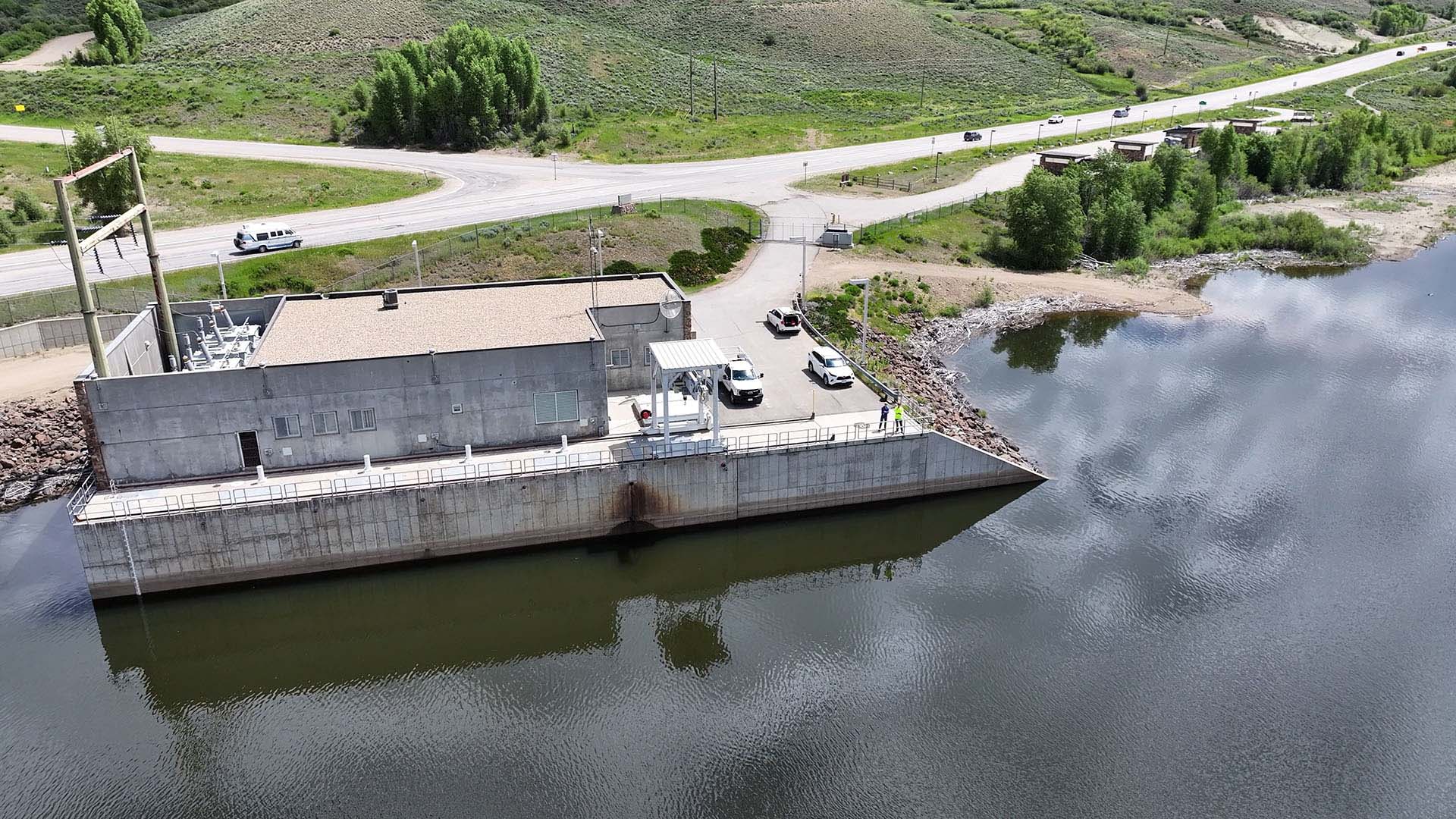 Aerial image of Windy Gap Pump Plant with water surrounding it.