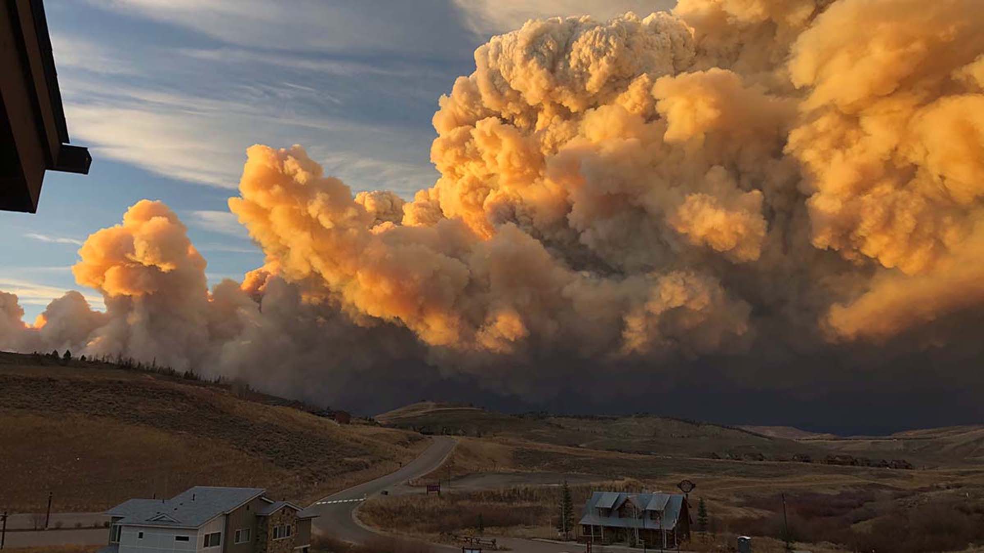 Fire clouds billowing over the horizon near Granby.