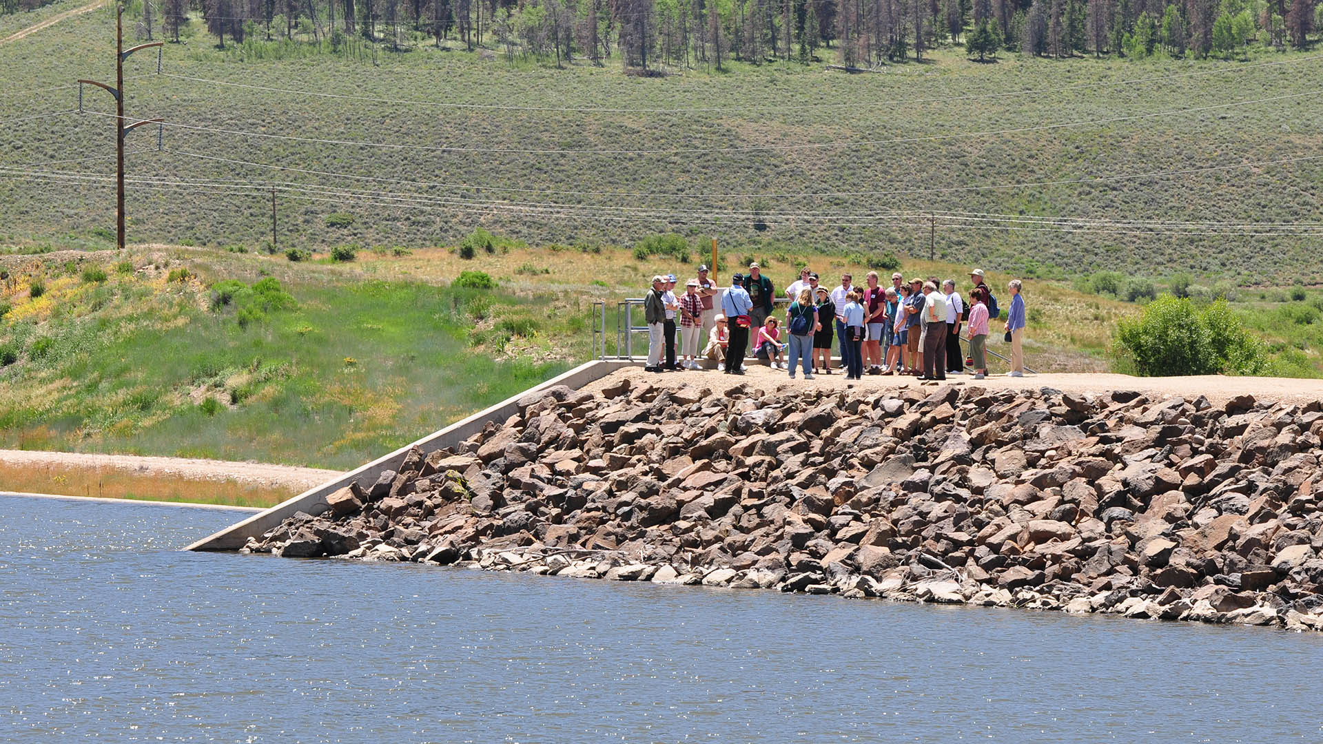 Group listening to presentation at Windy Gap Reservoir.