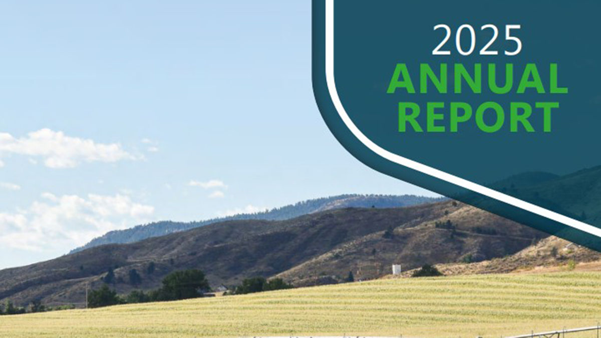 Rolling hills with farmland in foreground and hills in background. Top right corner says 2025 Annual Report.
