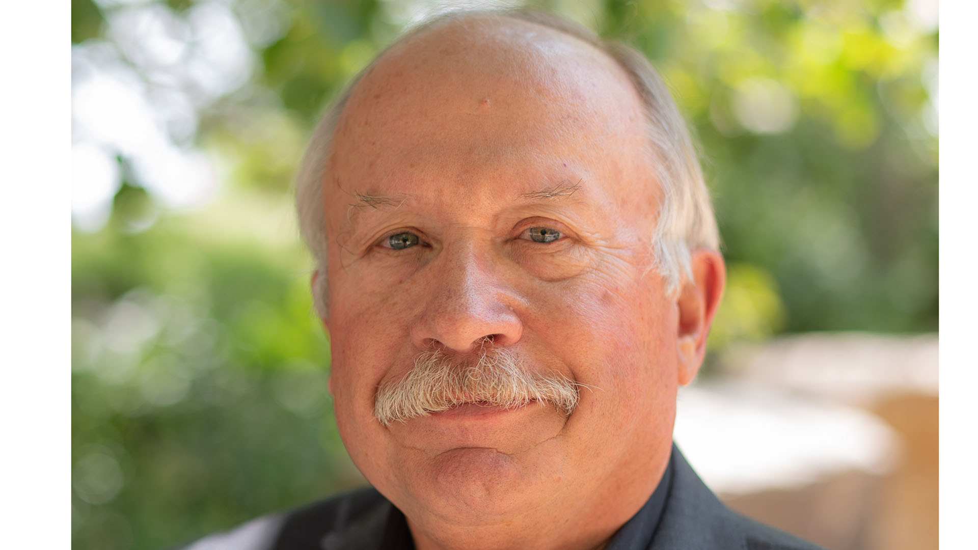 Portrait of Mike Applegate,  Director