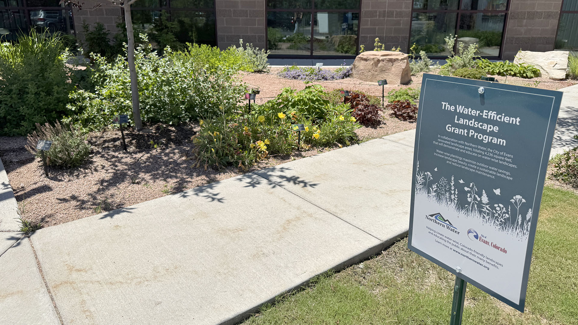 Grant sign within a transformed landscape.