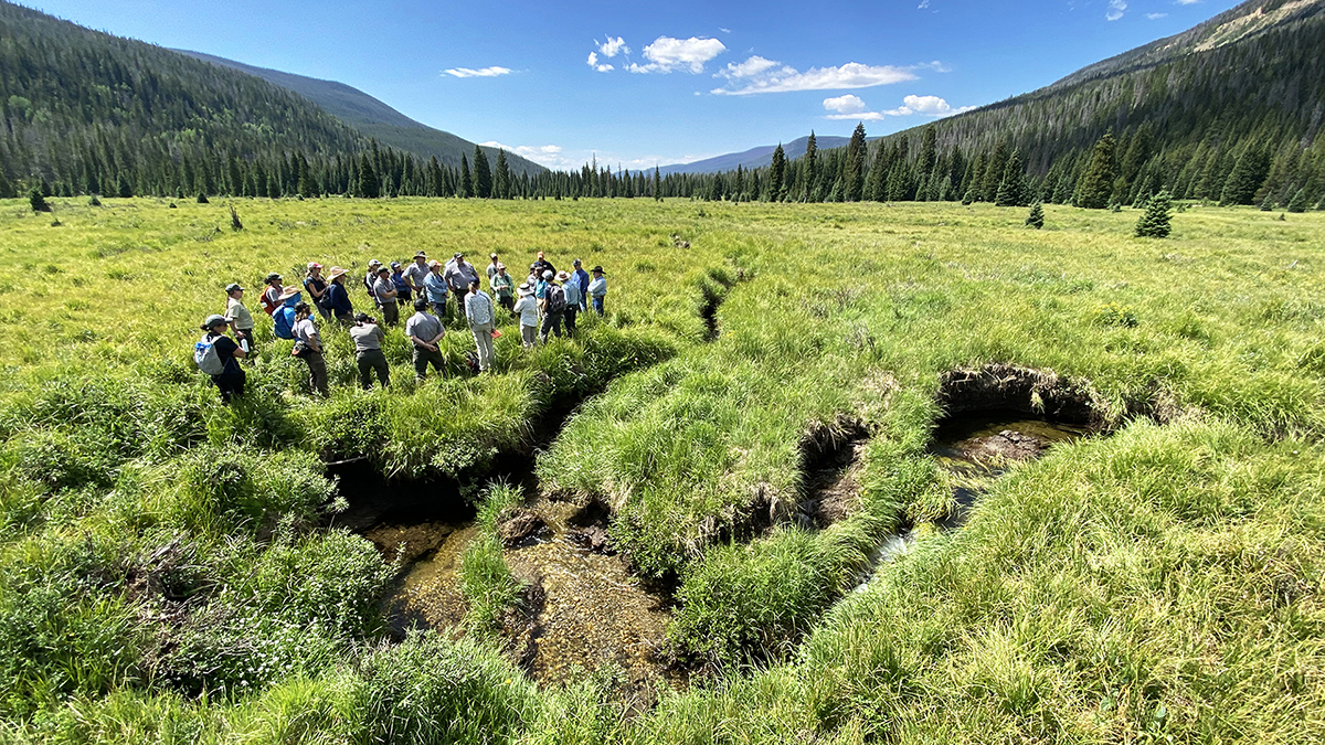 people standing in the KVRC valley of RMNP