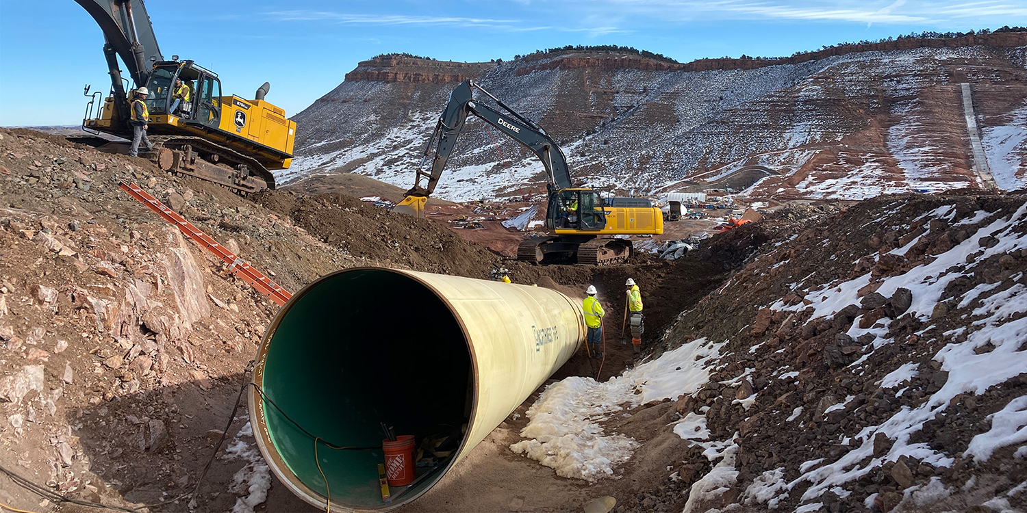Crews placing a portion of the Chimney Hollow conduit